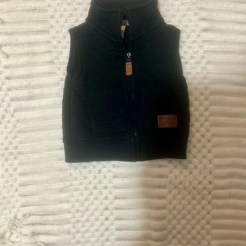 Black and Brown Quilted Vests for Cold Weather